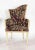 Pair of vintage, Grosfeld House asymmetrical Hollywood Regency style armchairs with a floral tapestry-style upholstery and...