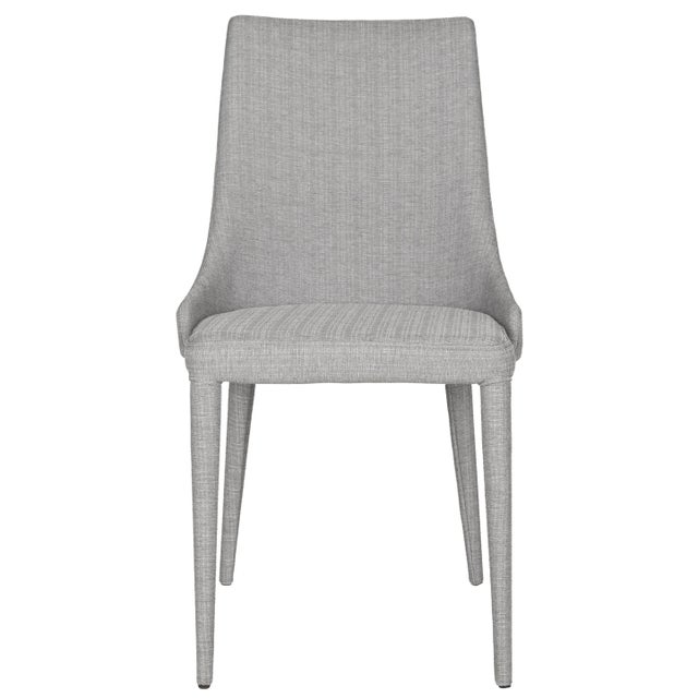 Luxe modern side chairs become ideal dining companions when crafted of easy-care grey linen fabric upholstered on a sturdy...
