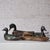 Set of four 19th-century French duck decoys, hand-carved and hand-painted from wood. Each piece showcases unique...