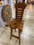 Handcrafted rustic wood chair featuring a thick live-edge seat with dramatic natural grain, knots and organic edges,...
