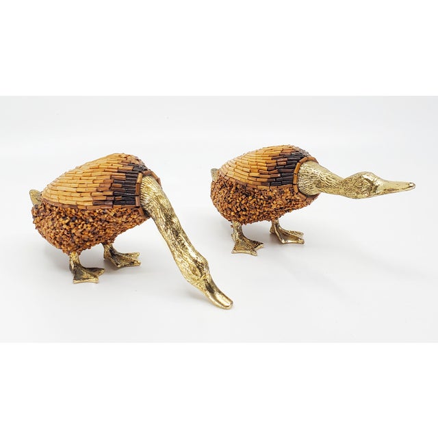 Offering a rare pair of hand-crafted Italian 1970s Brass & African bamboo beaded duck sculpture figurines by Tarzia -...