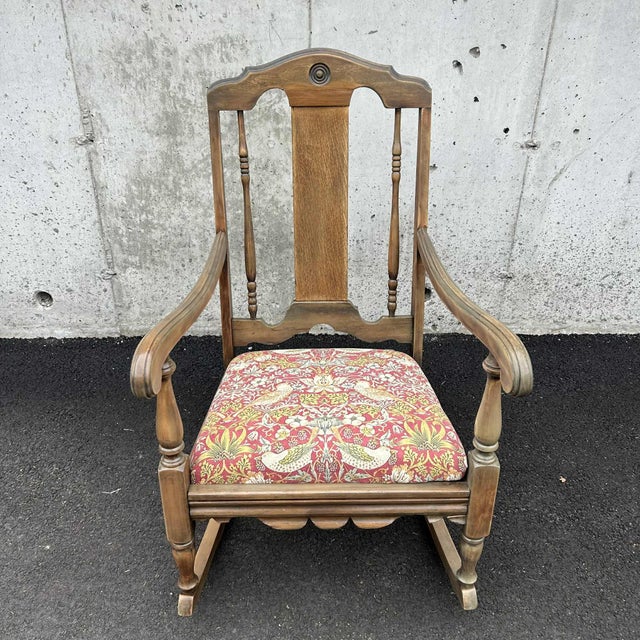 Whimsical and cozy, this vintage rocker is ready to make your home a little bit more inviting. We love the botanical and...