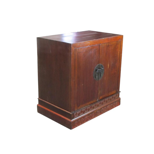 This refined 19th century cabinet is made of solid elm wood with a warm, reddish-brown lacquer finish that emphasizes the...