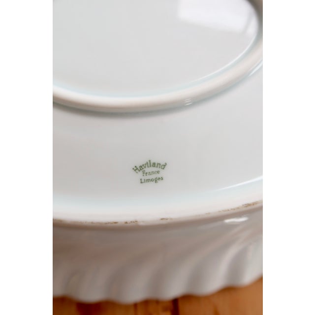 Elegant oval serving platter in white Haviland Limoges porcelain, France, featuring a delicate twisted relief that wraps...