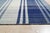 Sophisticated Elegant Blue Flatweave Wool Rug, Country of Origin: India. This exceptional flatweave piece showcases a...