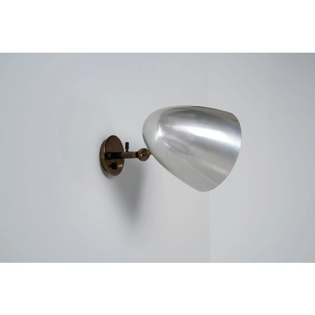 Minimalistic model 27 sconce designed by gino sarfatti and manufactured by arteluce, italy 1956. This minimalistic sconce...