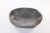 Interior of this free shaped river stone vessel is completely polished to show its natural greyish color. The outside is...