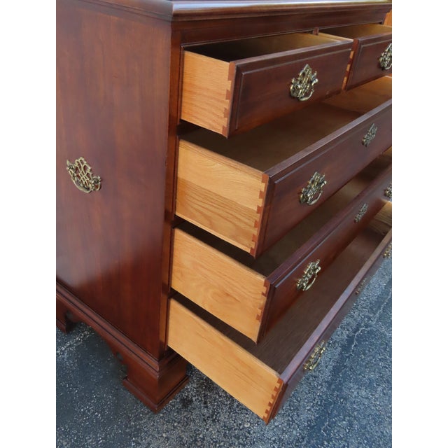 This Dresser is made out of wood, solid wood, cherry, veneer, and metal. The Dresser was made by Pennsylvania House...