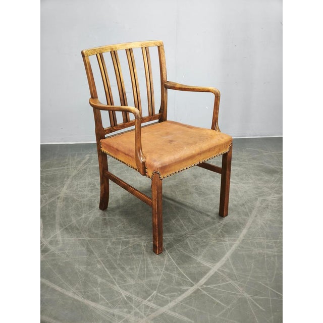 Rare and authentic Model 1675 armchair designed by Ole Wanscher for Fritz Hansen in 1942. Widely recognized as one of the...