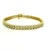 An elegant three-row diamond bracelet crafted in 14-karat yellow gold and set with 156 round brilliant-cut diamonds...