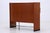 A rare vintage teak boomerang bar by Erik Buch for Dyrlund from the 1960s, featuring a striking, curved shape and a calm,...