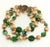 This is part of Chairish’s Costume Jewelry assortment. Bracelet made with green faceted beads with iridescent finish and...