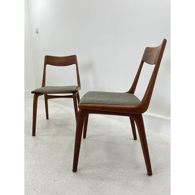 Classic Scandinavian Boomerang dining chairs (model #370) designed by Erik Christensen for Slagelse Møbelfabrik. Made in...