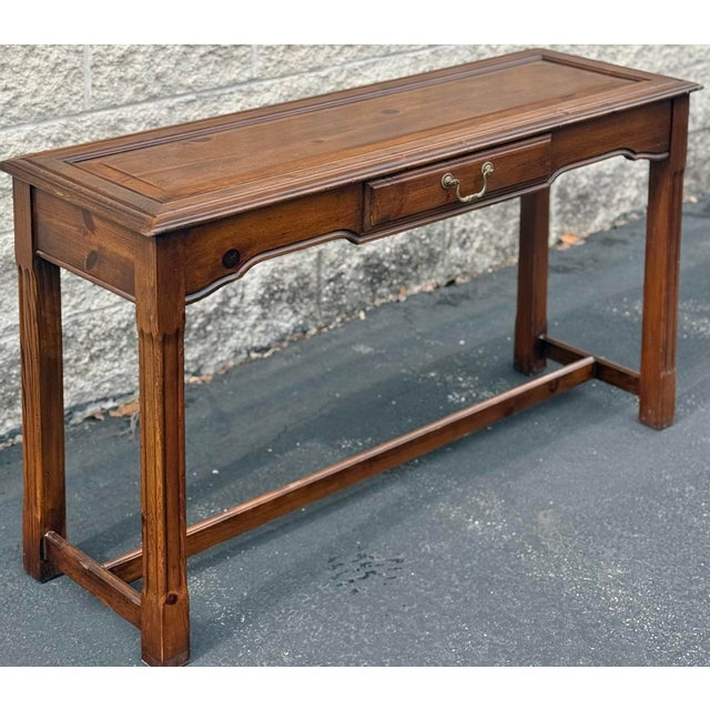 Very nice farmhouse style pine console table. Beautifully detailed raised panel molded top. Simple square legs with medial...
