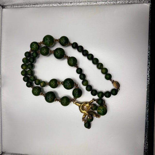 Bakelite 1950s Bakelite Pendant Necklace With Green and Yellow Marbled Beads and a Gold Tone Monkey Pendent Holding Beads Excellent Pre Owned Condition For Sale - Image 4 of 12
