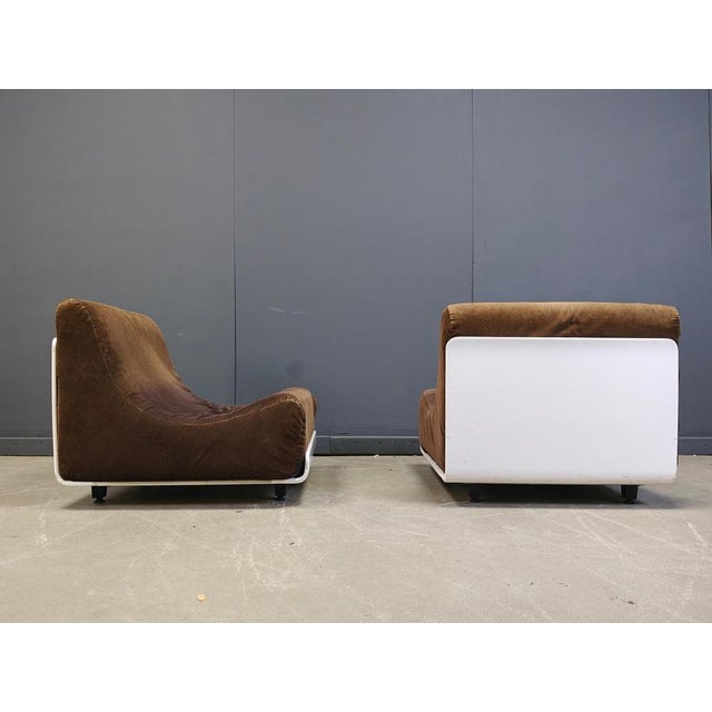 Rare pair of space age 'orbis' lounge chairs designed by Luigi Colani and produced by Cor in the 1970s. The chairs have a...