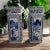 A pair of tall Chinese Blue and White Porcelain Vases with markings on the bottom. Hand painted scenery on 4 panels. Each...