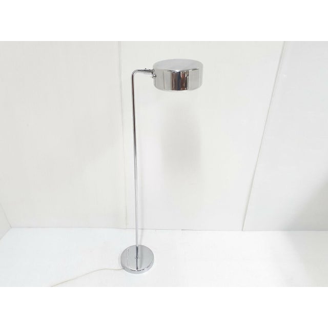 Good overall condition. Normal signs of wear and scratches, a scratch on the reflector, and the base is slightly curved...