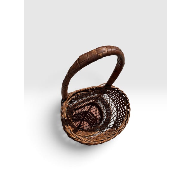 Early 20th Century Handwoven Wicker Rolling Market Basket With Iron Wheels For Sale - Image 4 of 9