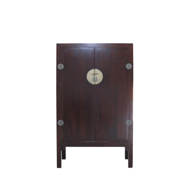 This 19th century antique cabinet features a classic, gently tapered design with a rich reddish-brown finish that...