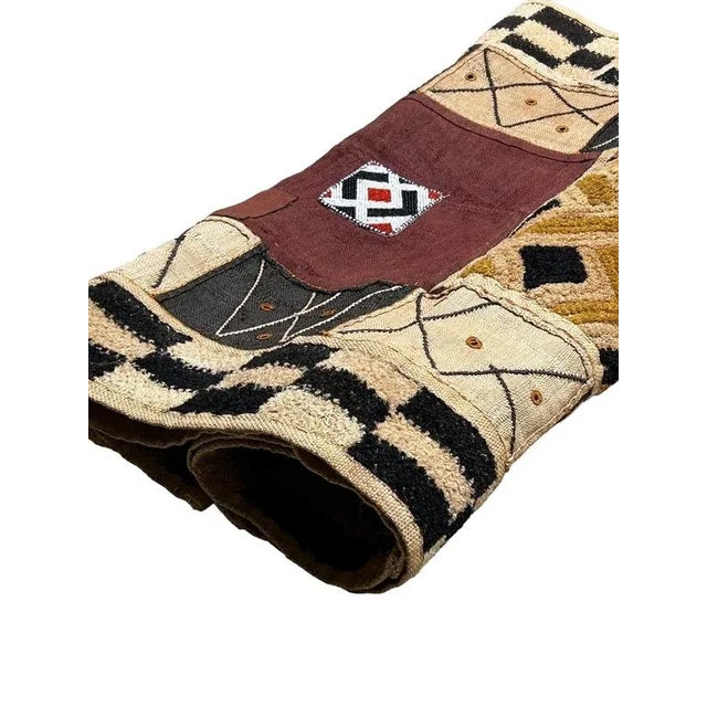 This cloth is known as Mapela and is gifted and worn at weddings. A stunning hand stitched textured fabric from the fiber...