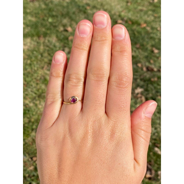 Nueve Calle: Oval Natural Ruby Set East to West Inside Yellow Gold Wave For Sale - Image 10 of 11