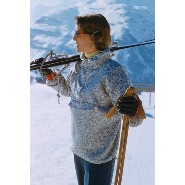 Parka Pondering by Toni Frissell A woman admires the view from the top of a piste in a ski parka jacket, 1956. (Toni...