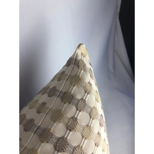 This beautiful pillow is made of Massoud fabric. Its dominant background color of cream with a very over woven pattern...