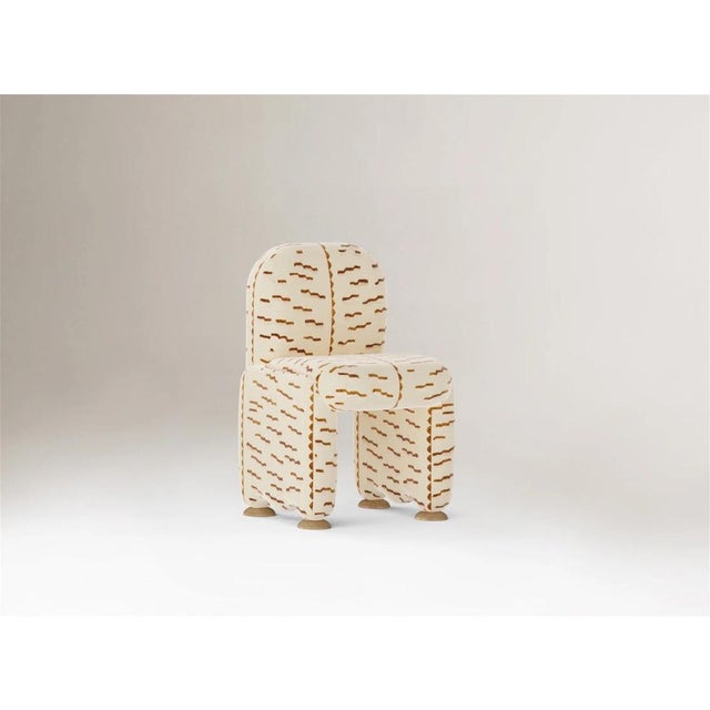 Discover Aimi, our avant-garde chair and armchair designed to redefine elegance and comfort. Visually light yet...