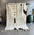 Bring timeless elegance into your home with this Moroccan Mrirt wool rug, handcrafted by skilled Berber artisans from the...