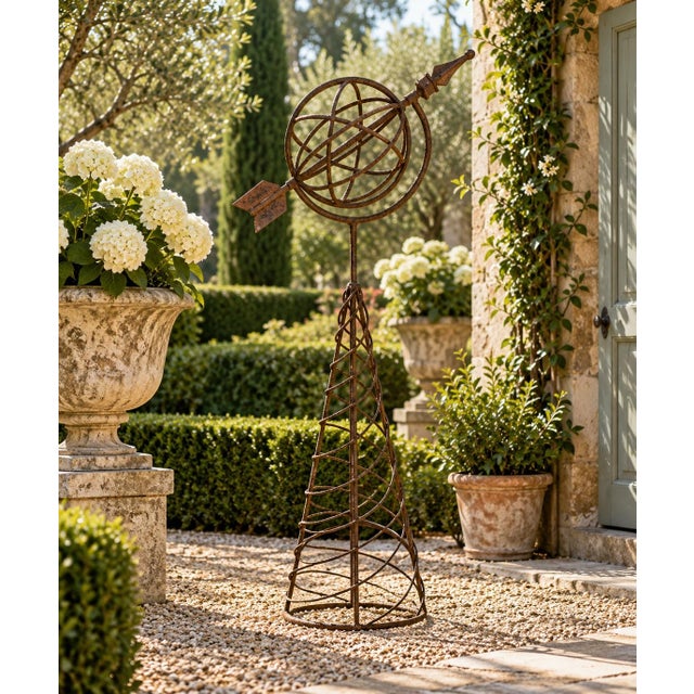 A beautifully crafted large iron armillary sphere, evoking the timeless elegance of classical European gardens. Pieces...