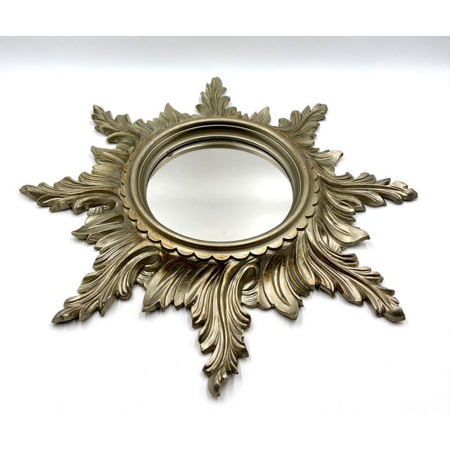 A stunning vintage Mid Century Italian resin sunburst / starburst mirror, circa 1960. Marked "Italy" on reverse. This...