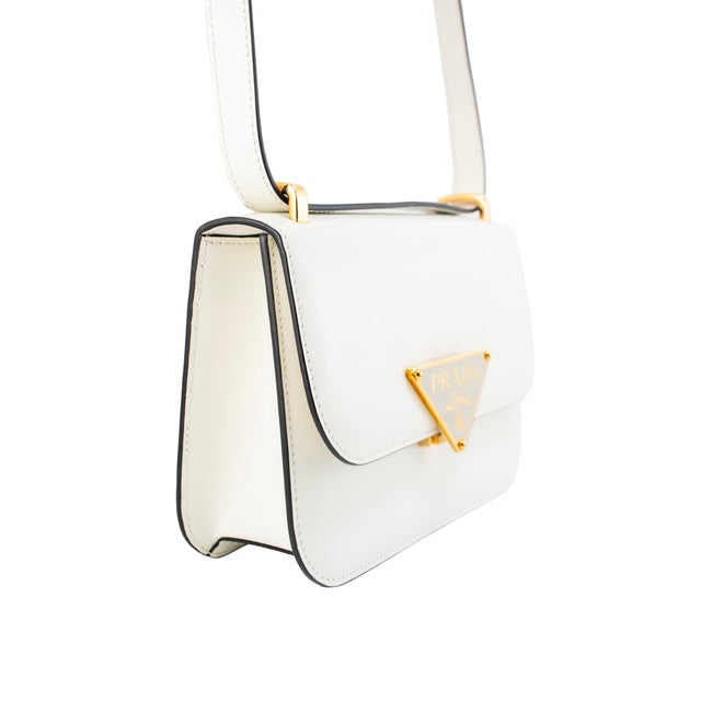 Brand: Prada Gender: Ladies Length: 8.00 inches Height: 6.00 inches Width: 2.50 inches Weight: 470.00 grams Prada White...