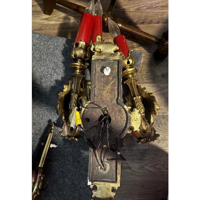 A dramatic pair of antique French Baroque Revival wall sconces, dating to the late 19th–early 20th century. Each...