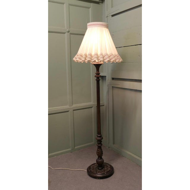 Carved Edwardian Floor Lamp, Standard Lamp A very attractive piece carved and turned in walnut, this lamp stands on an...