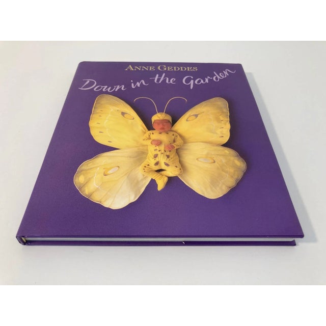 Anne Geddes Down in The Garden Hardcover 1996. Anne Geddes DOWN IN THE GARDEN large hardcover coffee table book with dust...