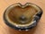 This 1970's Murano-style brown and gold glass bowl measures approximately 7" x 6.5" X 3". It retails for approximately...