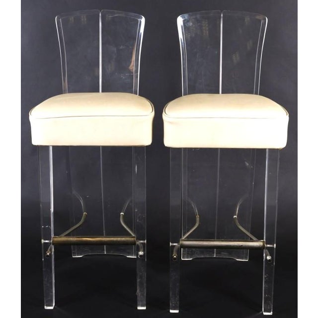 A pair of fabulous mid century modernist lucite bar chairs from Hill Manufacturing Co. (Newburgh NY). These chairs are...