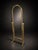 Elegant vintage Hollywood Regency–style freestanding cheval mirror featuring a polished brass-tone metal frame and tall...