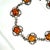 Antique Edwardian sterling and amber link bracelet 1900s. Openwork links in a flowing design feature open-back bezel-set...
