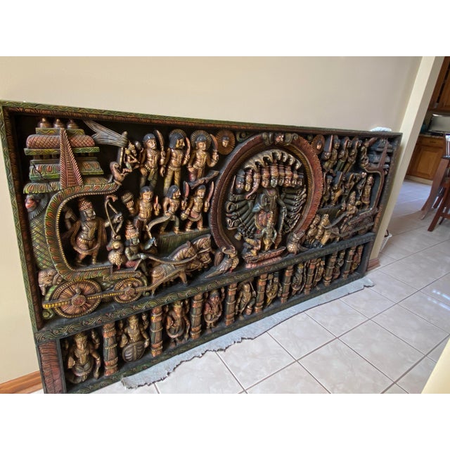 Indian mythology scene with Vishnu hand carved from single piece of wood.Unique piece shipped here by sea from boutique...