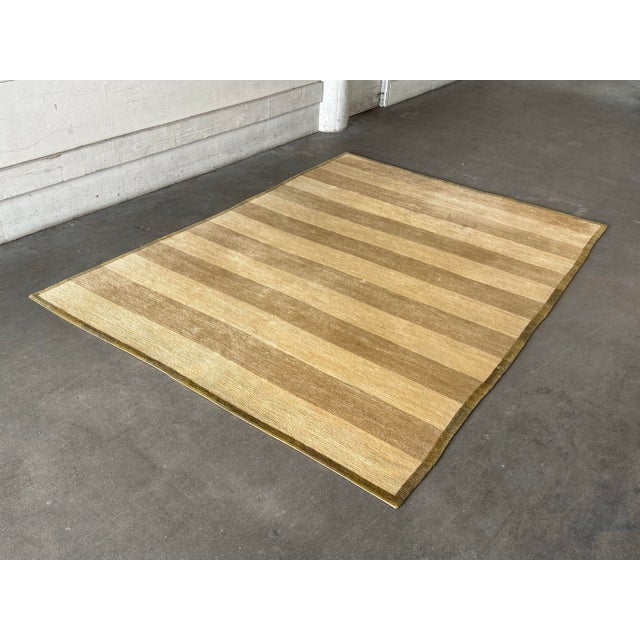 Design Plus Gallery presents a 10ft × 13ft 11in Tibetan Shakti Collection Wool Area Rug from Tufenkian. Known for its...