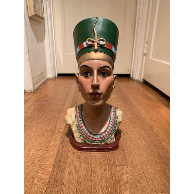 Painted composite bust of an Egyptian. Put on top of your head and walk like an Egyptian anytime!