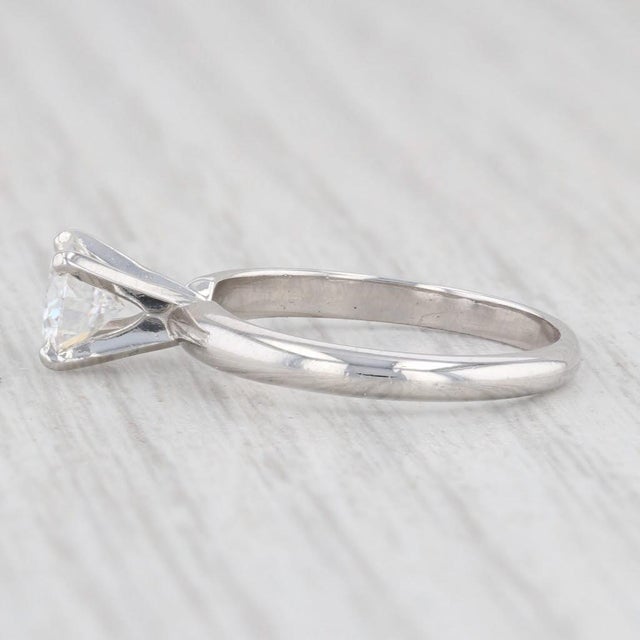 Gem: Moissanite - 0.70 Carats (6 mm), Round Brilliant Cut, Colorless / White Color Metal: Platinum Weight: 3.7 Grams...