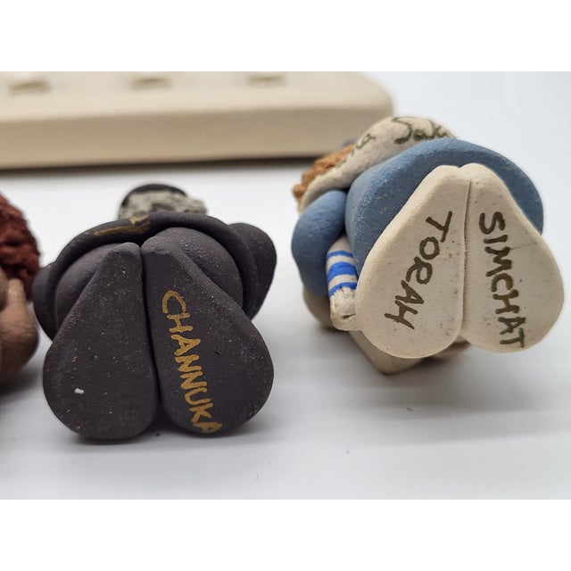 Exceptional handmade ceramic Hanukkah menorah by Jerusalem artist Lorna Sakalovsky, dated 1988 and marked on the...