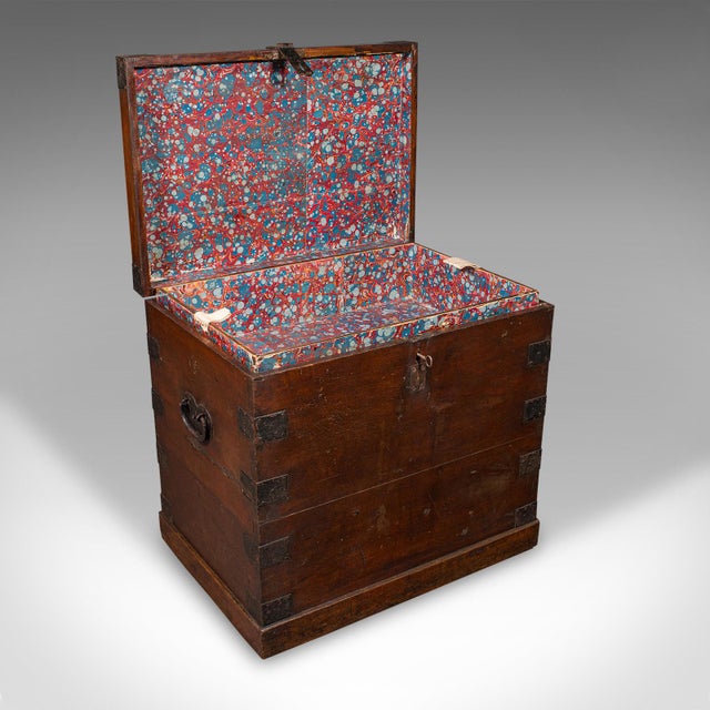This is an antique silver chest. An English, oak and bound iron storage trunk, dating to the Georgian period, circa 1800....