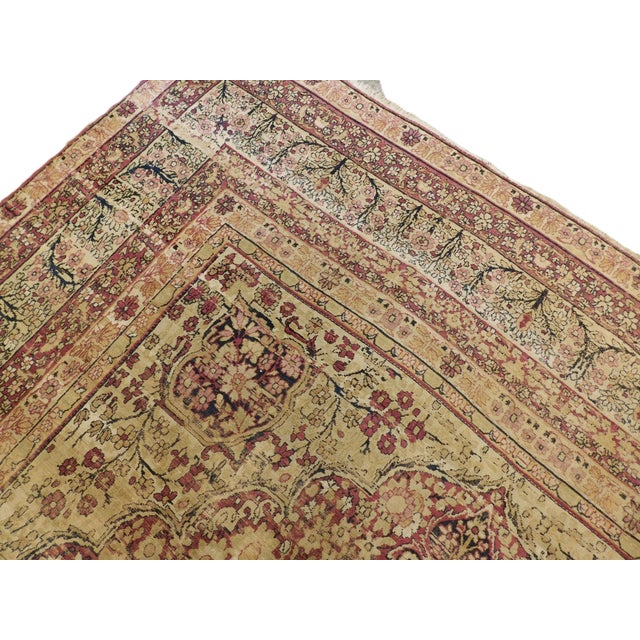 Multi layered medallion, flanked on both sides. Floral decorated main border in ivory, with three inner and two outer...