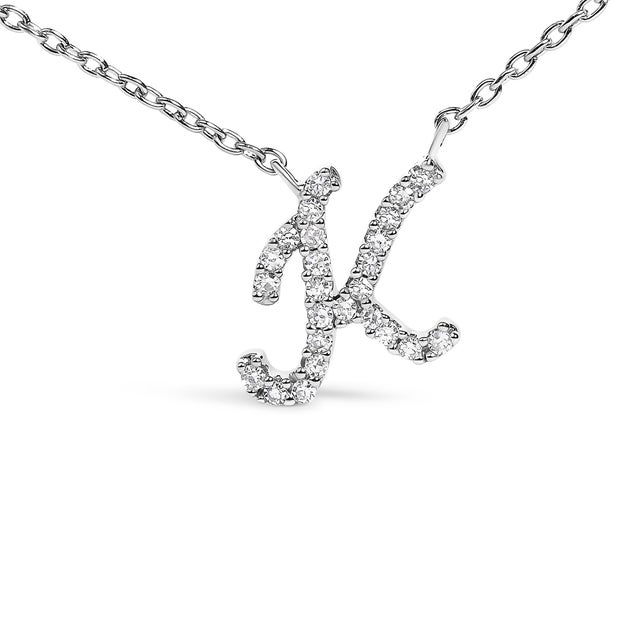 Embrace the elegance of personalization with this stunning 10K White gold pendant, delicately crafted into a flowing...