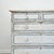 Dimensions: 40.25"W x 19"D x 36"H A beautiful late 19th-century pine dresser. Painted in a soft cream color and accented...