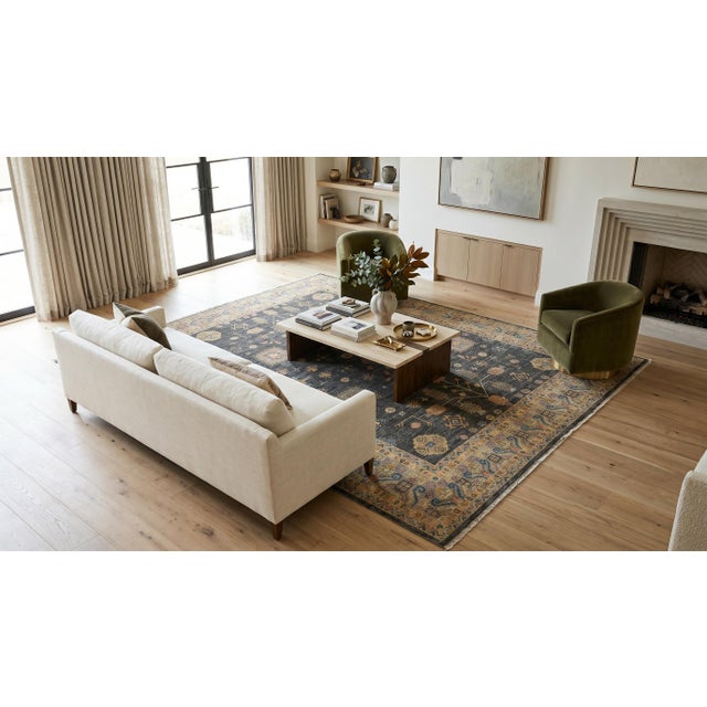 This Modern Khotan Style Handmade Wool Rug merges East Turkestan artistry with a contemporary color palette. Crafted from...